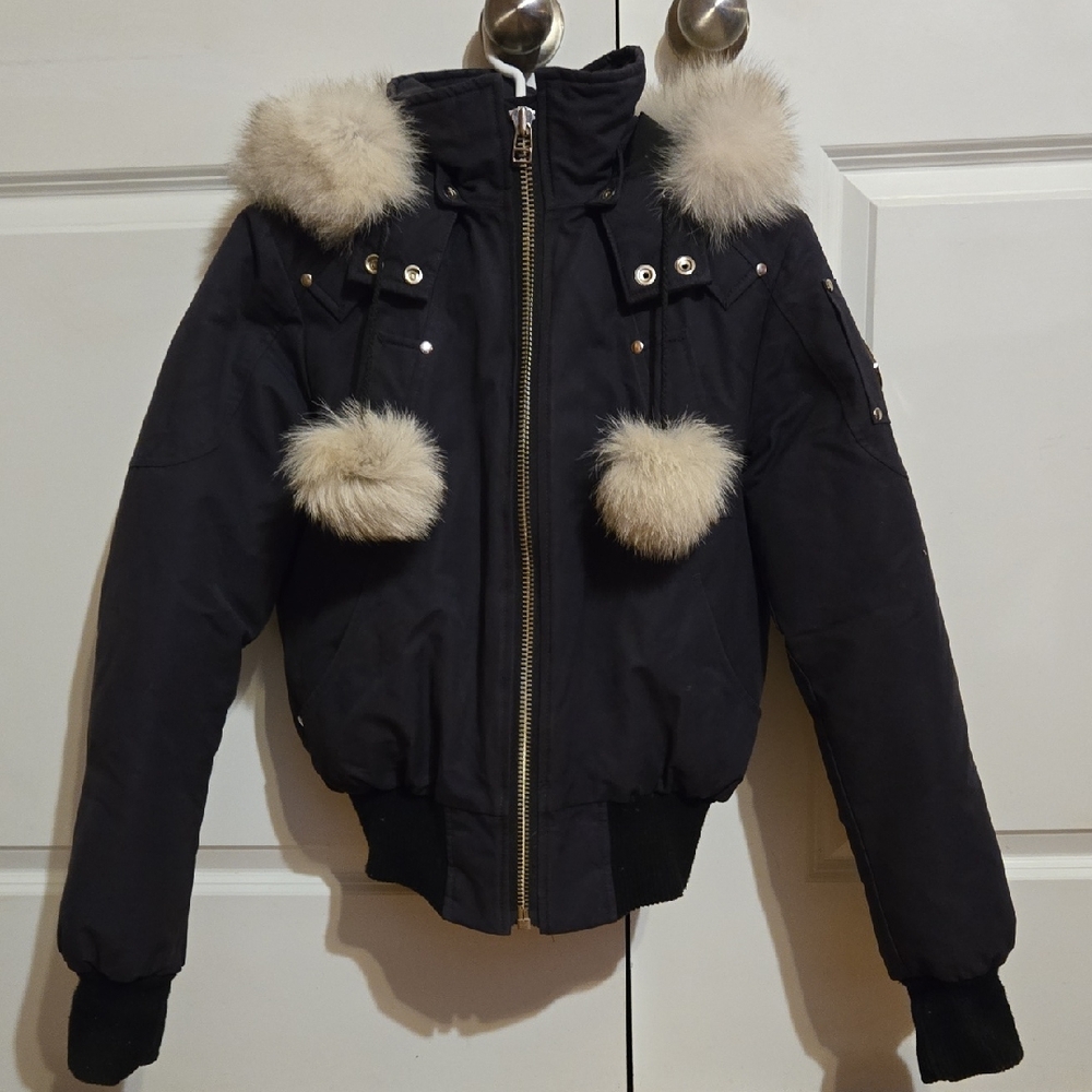 Moose Knuckles bomber jacket with fur hood.